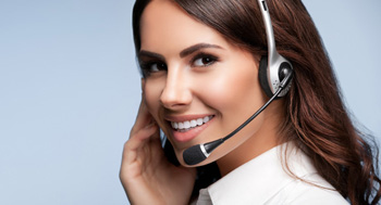 customer support phone operator in headset, with blank copyspace area for slogan or text message, over grey background. Consulting and assistance service call center.